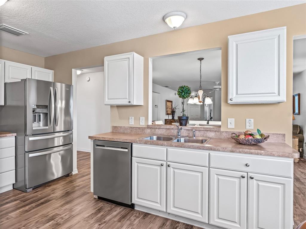 1906 HARSTON TRAIL, THE VILLAGES, FL — photo 3 of 30