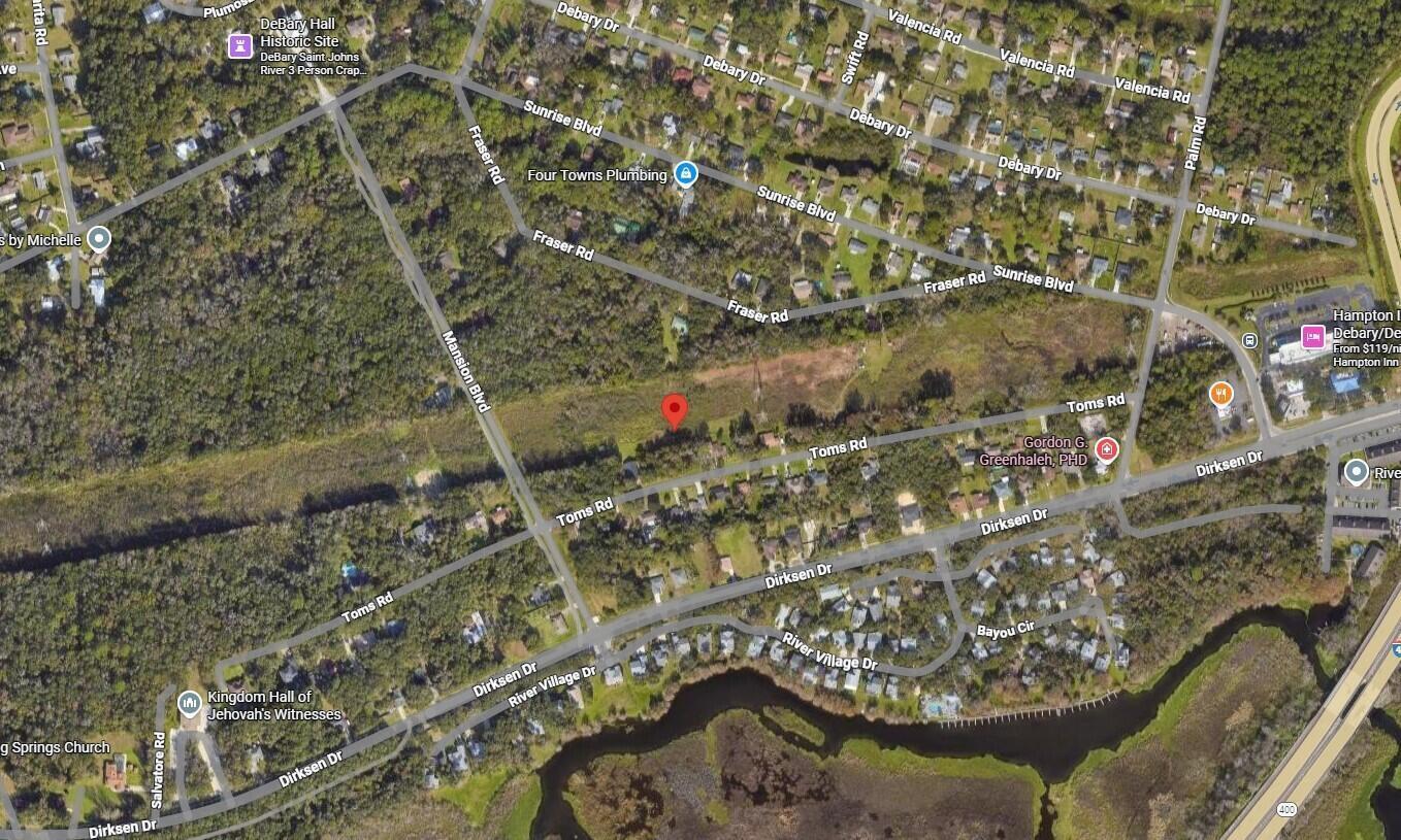 This is an aerial map view of a residential area with surrounding roads and vegetation — 242 Toms Road, FL 32713, FL