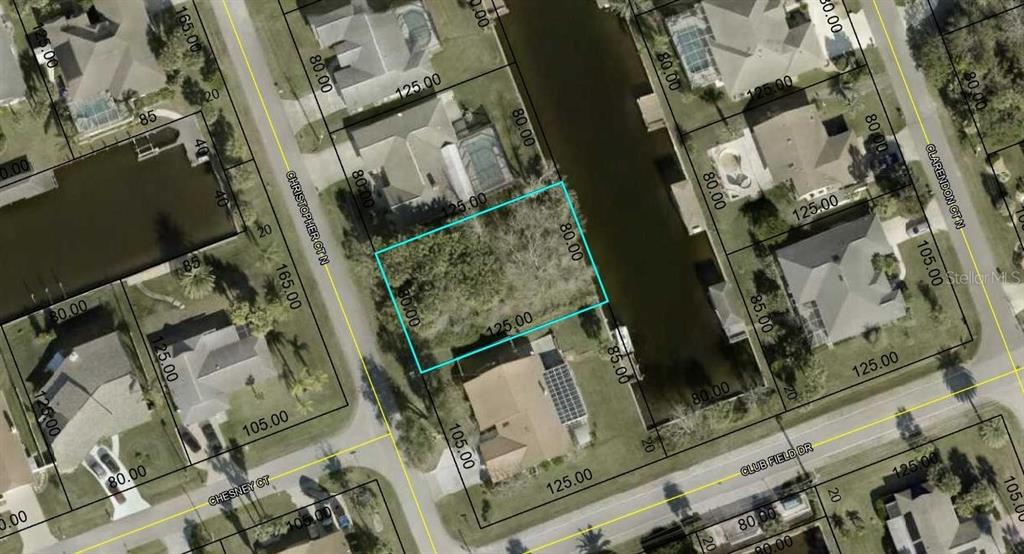 This is an aerial map showing a vacant residential lot outlined in blue — 25 CHRISTOPHER COURT N, PALM COAST, FL