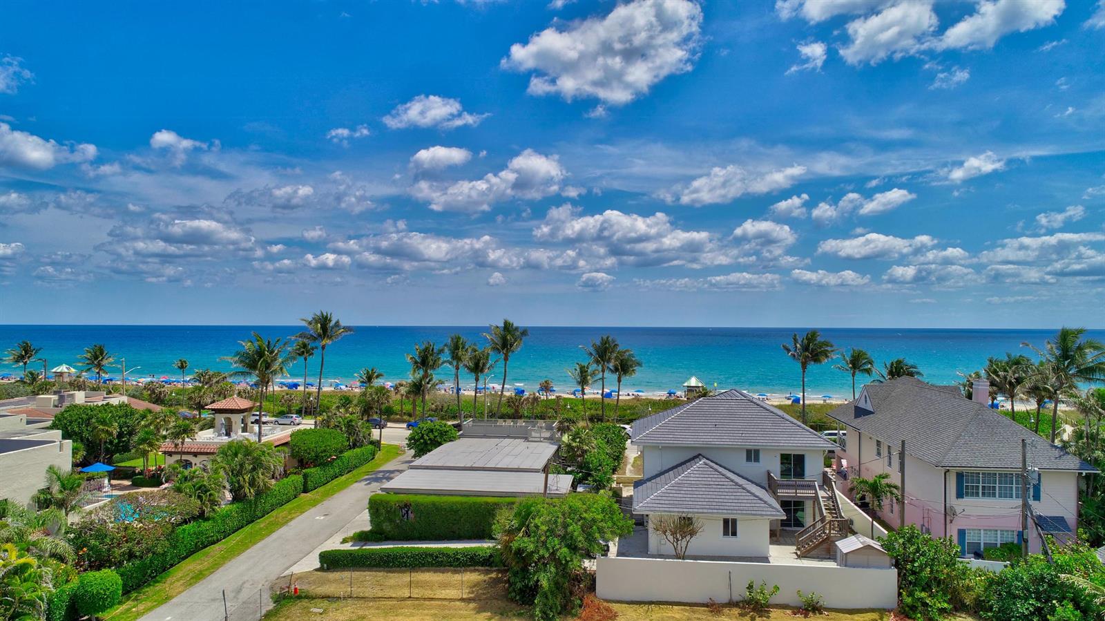 An aerial view of a coastal neighborhood with houses, palm trees, and a sandy beach — 1120 Ocean Terrace, Delray Beach FL 33483, DELRAY BEACH, FL