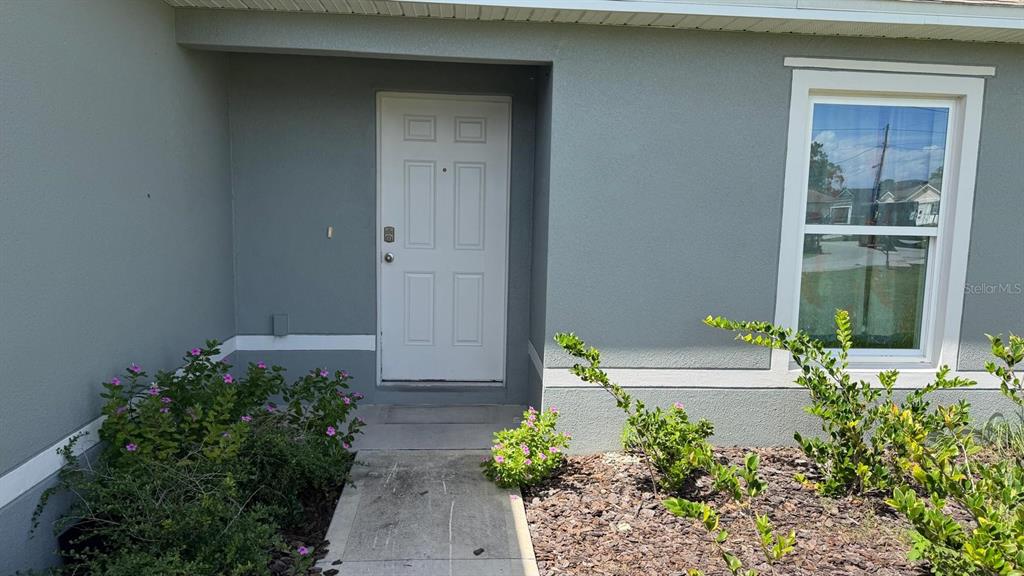 1623 REDFIN DRIVE, POINCIANA, FL — photo 2 of 12