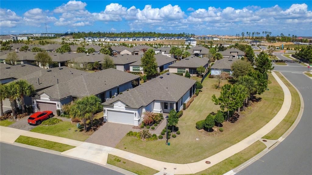 This is a floor plan of a single-story home with a garage and covered patio — 2330 HAMILTON RIDGE ROAD, CLERMONT, FL