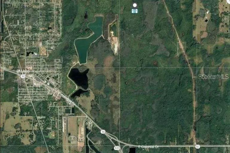 This is an aerial map view showing a rural area with lakes and highway intersections — DILL ROAD, ORLANDO, FL