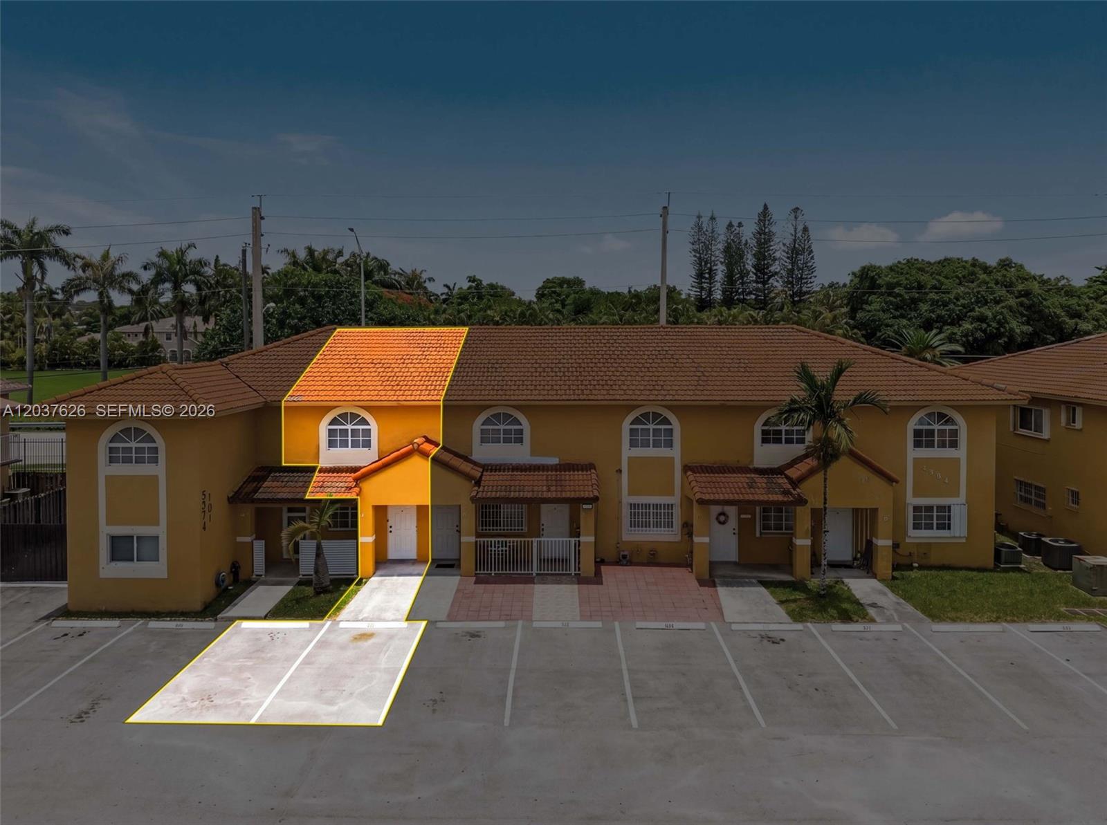 An aerial view shows a two-story townhouse unit highlighted in yellow with assigned parking — 3574 W 80th St # 201, Hialeah FL 33018, HIALEAH, FL