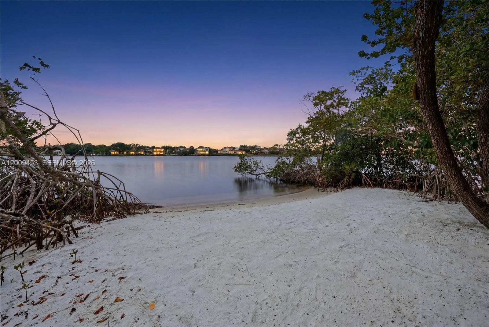This rendering shows a person on a balcony overlooking a pool, deck, and water — 18200 49 Terrace N, Jupiter FL 33458, JUPITER, FL
