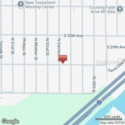 This is a map showing a red location pin on a street grid — 3601 N GARRISON STREET, TAMPA, FL