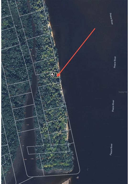 An aerial map view shows a waterfront parcel of land along the Peace River — 1206 MALABO COURT, PUNTA GORDA, FL