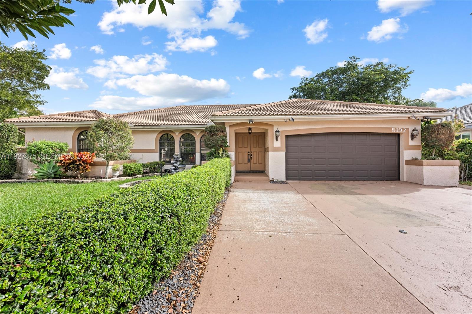 5197 NW 58th Ter, Coral Springs FL 33067