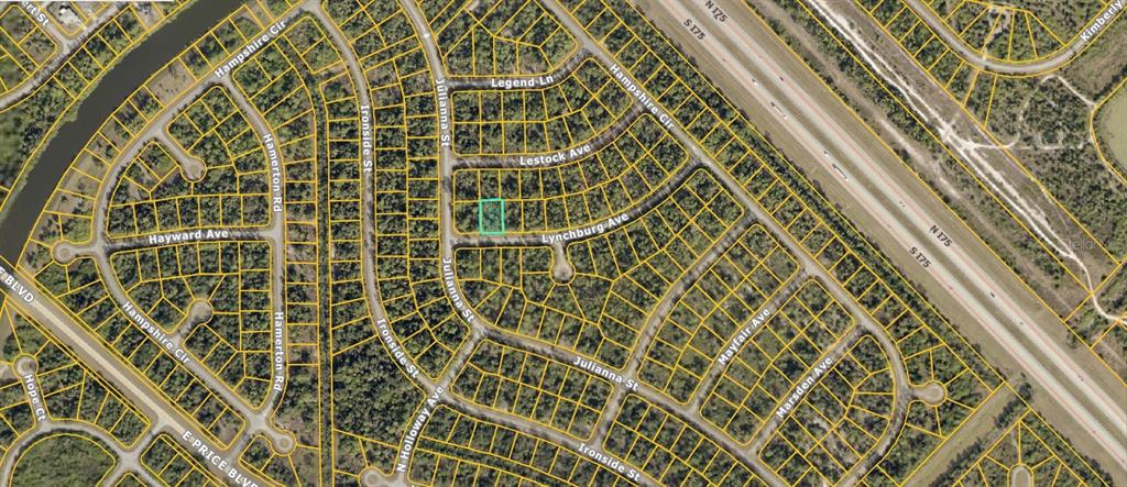 This is an aerial map showing a vacant lot highlighted in a residential neighborhood — 1132212720 LYNCHBURG AVENUE, NORTH PORT, FL