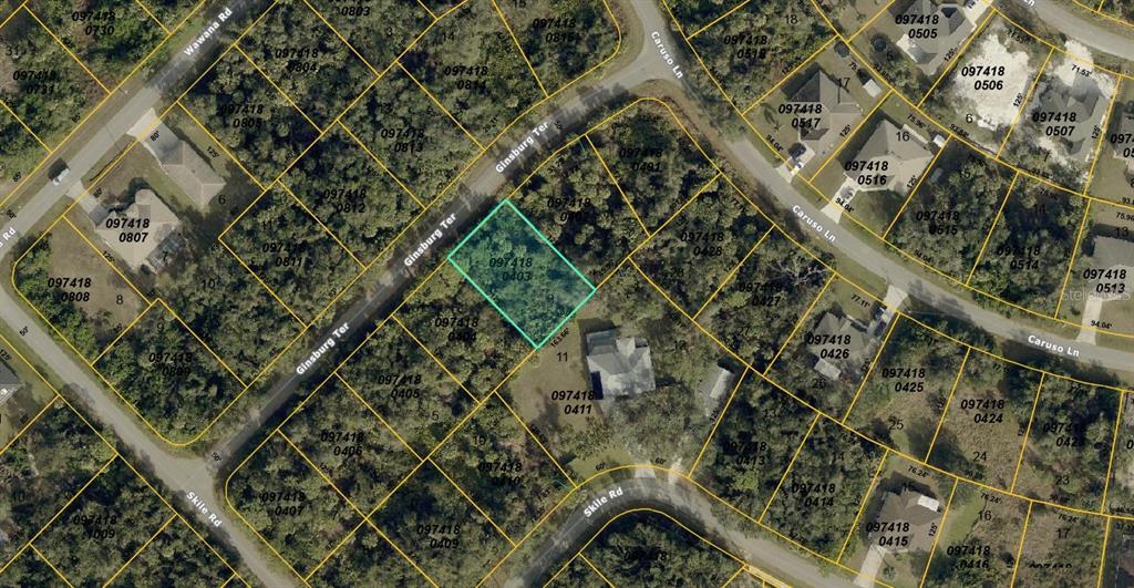 This is an aerial map showing a highlighted vacant lot surrounded by residential properties — 0974180403 GINSBURG TERRACE, NORTH PORT, FL
