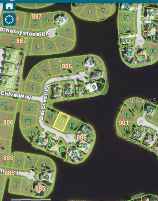 This map shows a vacant residential lot highlighted in yellow within a waterfront neighborhood — 17209 BARCREST LANE, PUNTA GORDA, FL