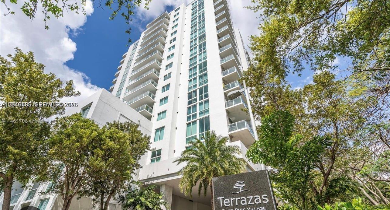 A low-angle view shows the white exterior of the Terrazas high-rise residential building — 1861 NW S River Dr # 2503, Miami FL 33125, MIAMI, FL