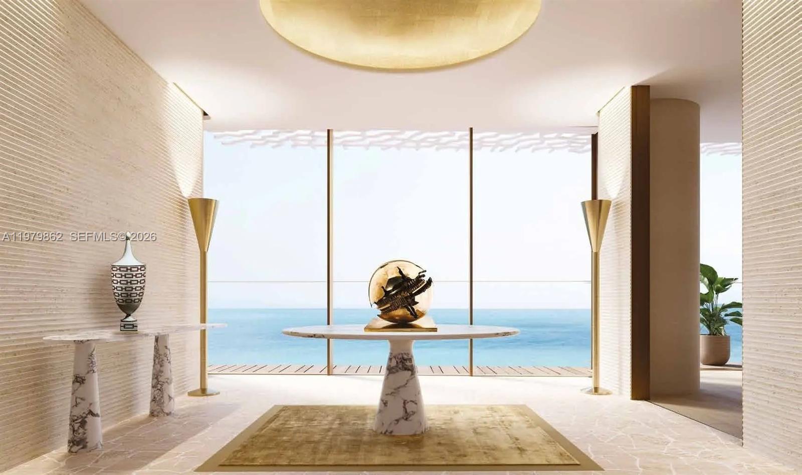 This rendering shows a minimalist foyer with marble tables, gold accents, and an ocean view — 2 Al Mouje Street # 0, Dubai, FL