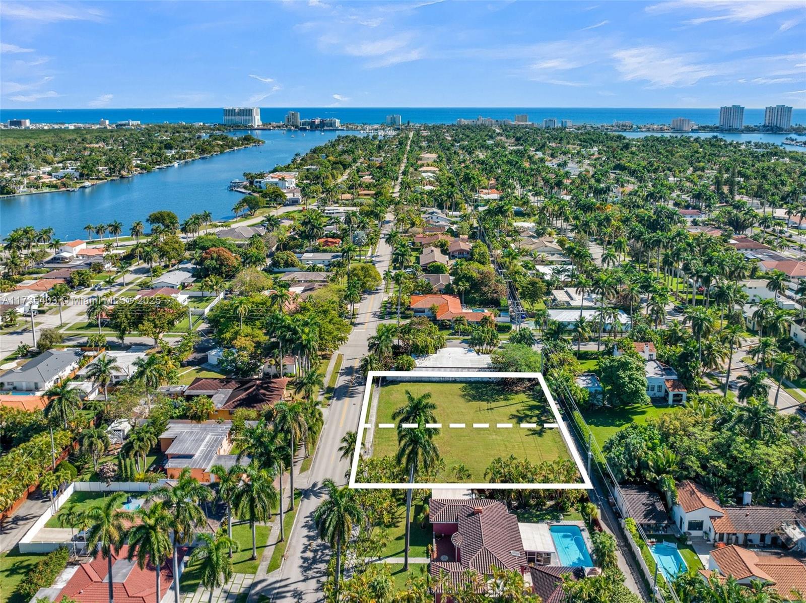 An aerial view shows a vacant rectangular lot outlined in white within a residential neighborhood — 1312 Polk St, Hollywood FL 33019, HOLLYWOOD, FL