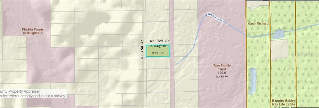 This is a map showing a highlighted rectangular land parcel with its dimensions labeled — CHRISTMAS ROAD, ORLANDO, FL