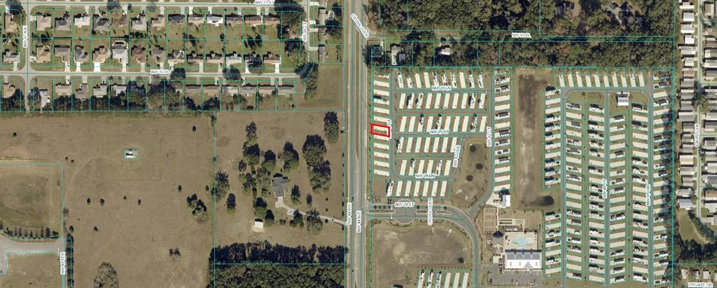 This aerial map shows a residential neighborhood with a highlighted lot in a mobile home park — 2918 NW 43RD COURT, OCALA, FL