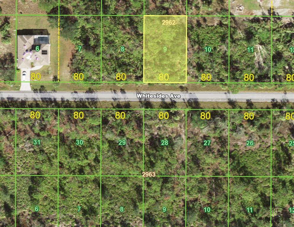 This is a map showing a vacant residential lot highlighted in yellow along a road — 14266 WHITESIDES AVENUE, PORT CHARLOTTE, FL