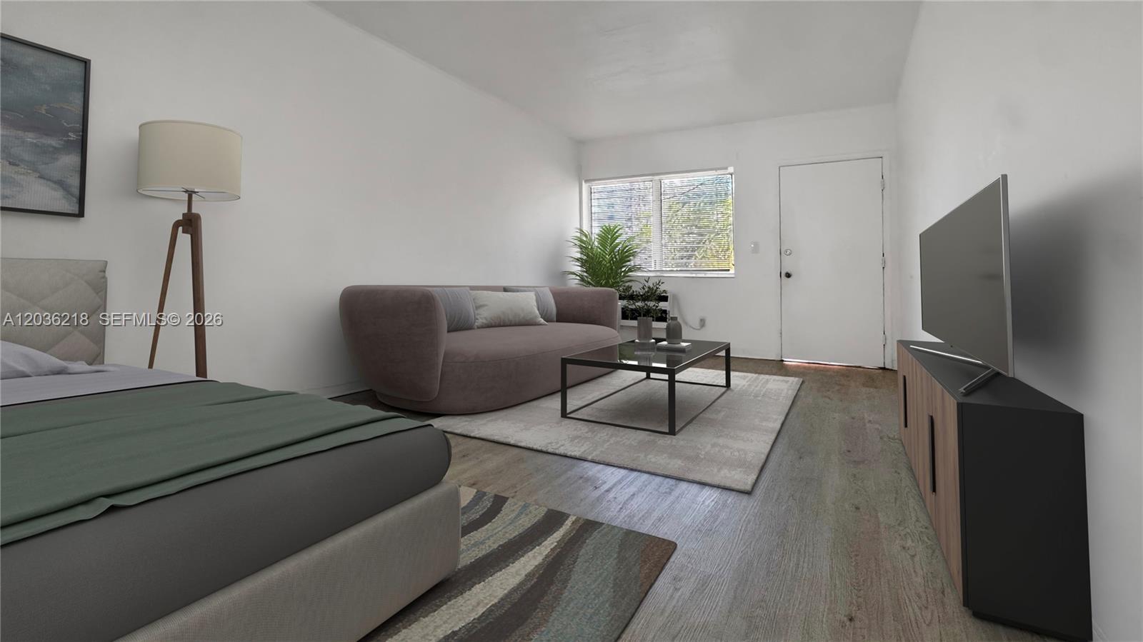 This is a digital rendering of a studio apartment featuring a bed, sofa, and television — 7717 Byron Ave # 12, Miami Beach FL 33141, MIAMI BEACH, FL