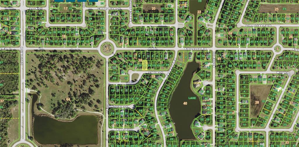 This is a satellite map showing residential lots, streets, and a lake in a neighborhood — 118 CABLE DRIVE, ROTONDA WEST, FL