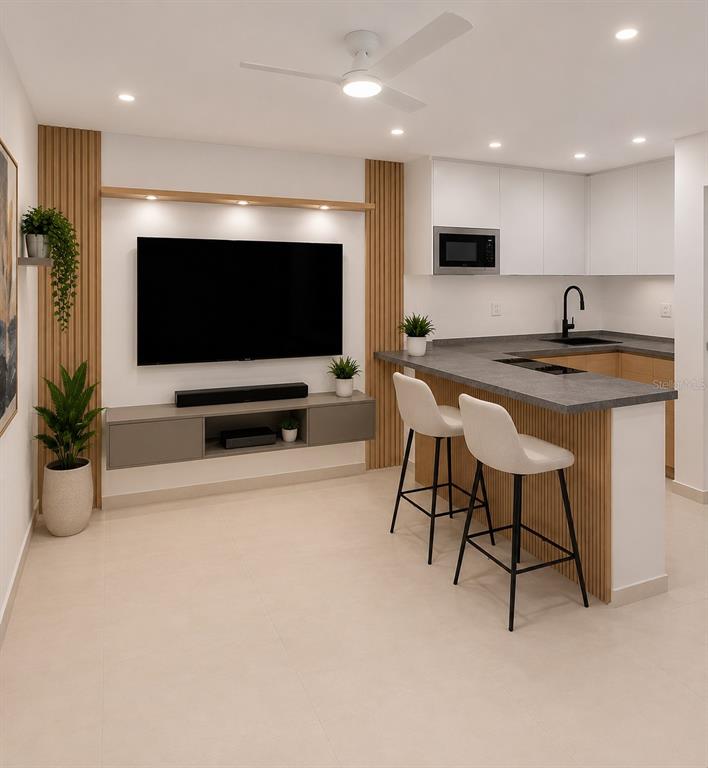 This rendering shows a modern open-concept living room and kitchen with wood-slat wall accents — 602 Ave Fernandez Juncos COND. SEA VIEW UNIT 1704, SAN JUAN, PR