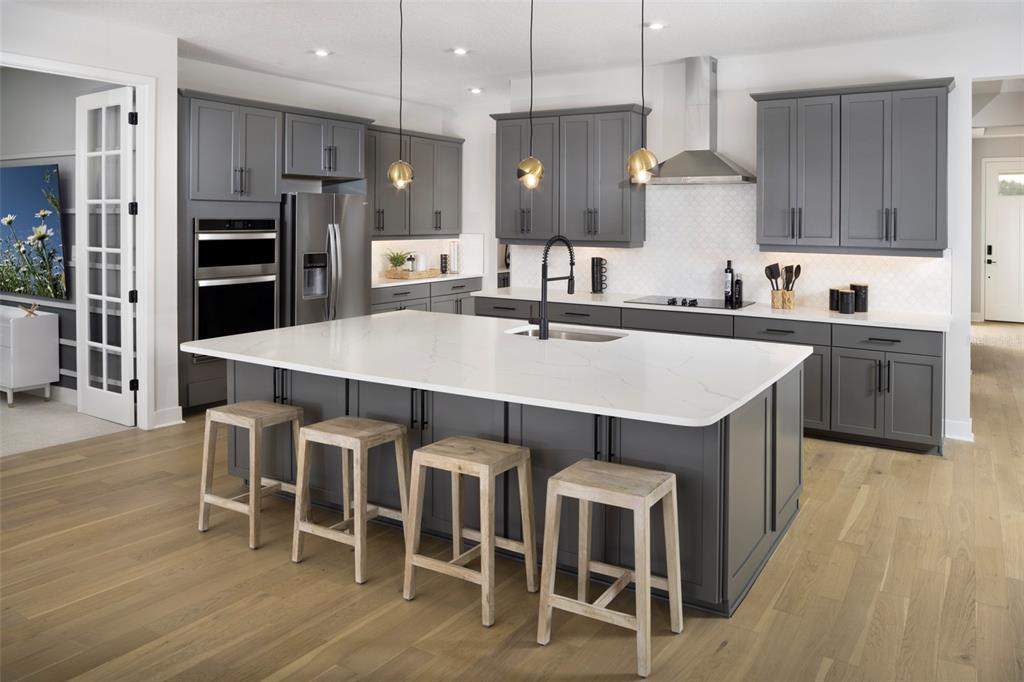 This is a floor plan for a single-story house with four bedrooms and a garage — 9017 SUNDANCE TERRACE, PARRISH, FL