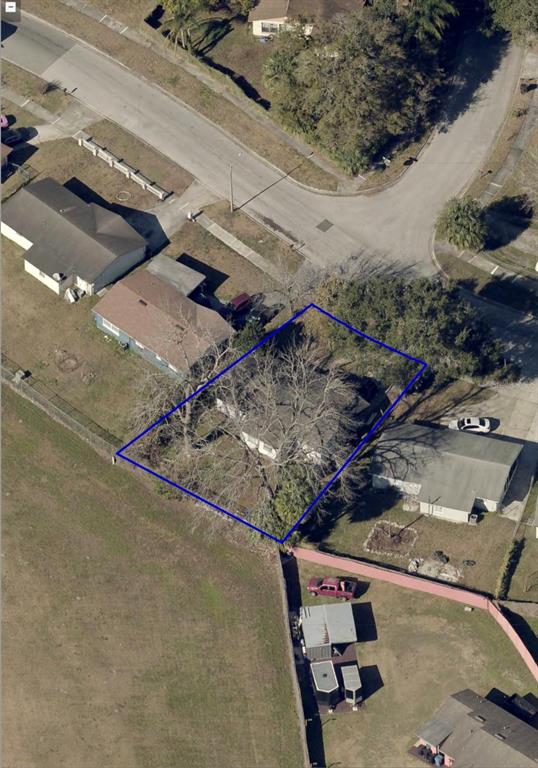 An aerial view shows a residential property outlined in blue with a house and trees — 4668 MIRAMAR ROAD, ORLANDO, FL