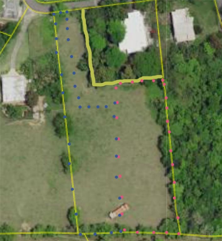 This aerial map shows a plot of land with property boundaries highlighted in yellow — 14 CALLE 16, VIEQUES, PR