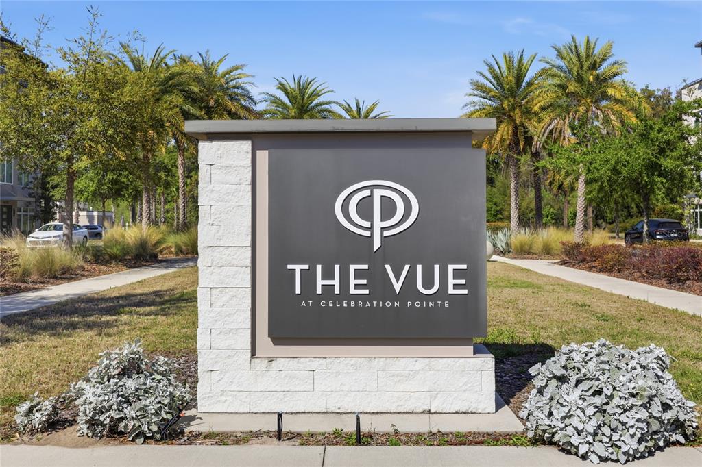A stone and metal monument sign for The Vue at Celebration Pointe stands outdoors — 5016 SW 34TH PLACE, GAINESVILLE, FL