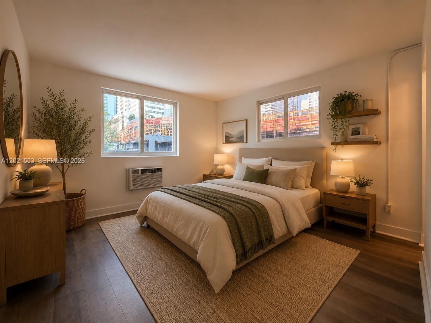 A bedroom features a queen bed, wooden nightstands, a dresser, and a window view — 143 SW 9th St # 106, Miami FL 33130, MIAMI, FL