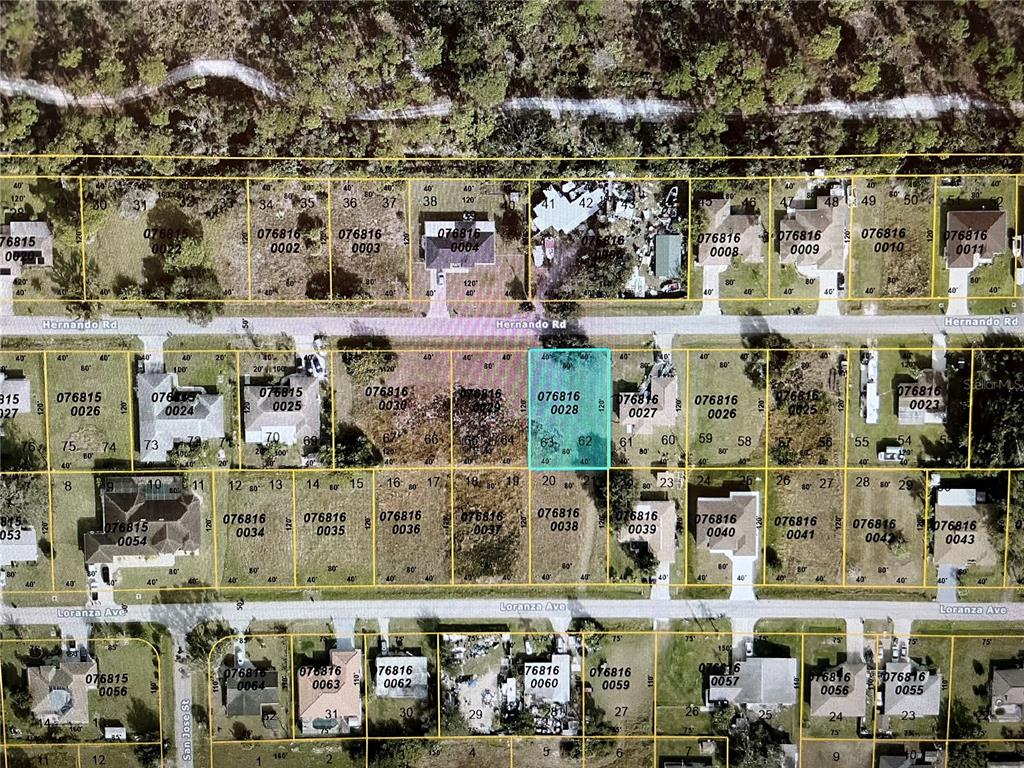 This is an aerial map showing residential lots and streets — LOT 62&63 HERNANDO ROAD, NORTH PORT, FL