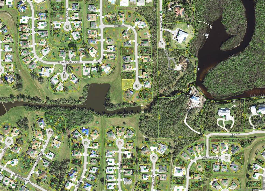 This is an aerial map showing residential lots and streets in a suburban neighborhood — 219 SANTOS (LOT 8) DRIVE, PUNTA GORDA, FL