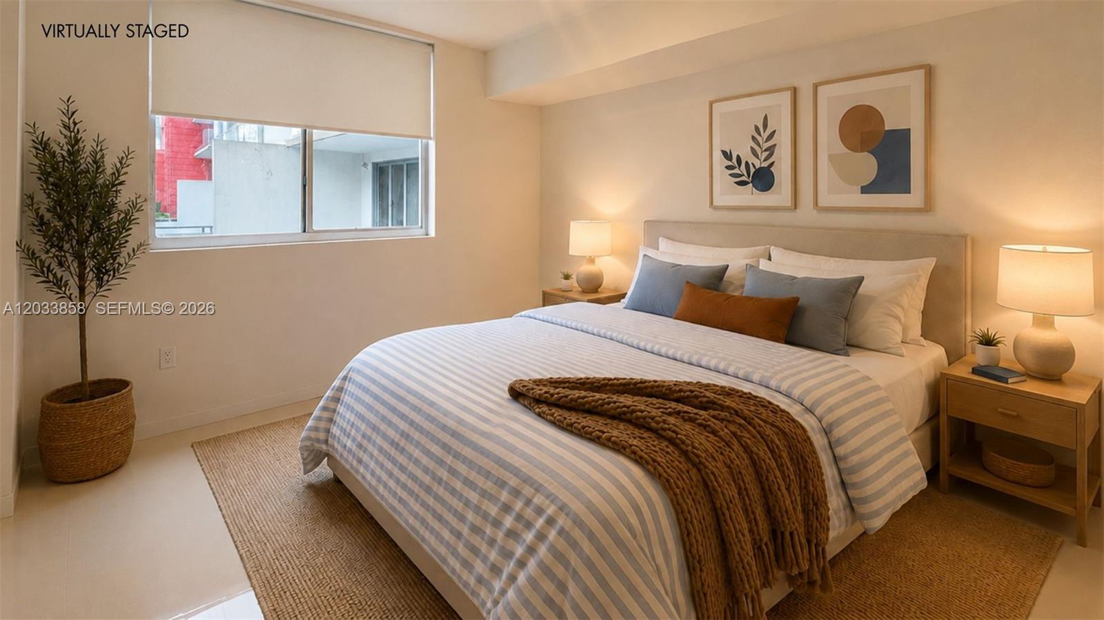 A virtually staged bedroom features a bed with striped bedding, two nightstands, and a window — 7825 NW 107th Ave # 218, Doral FL 33178, DORAL, FL