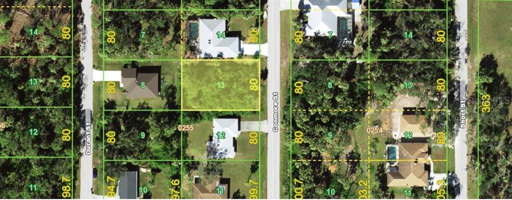 This is an aerial map showing a vacant residential lot highlighted in yellow among houses — 3509 CONMORE STREET, PORT CHARLOTTE, FL