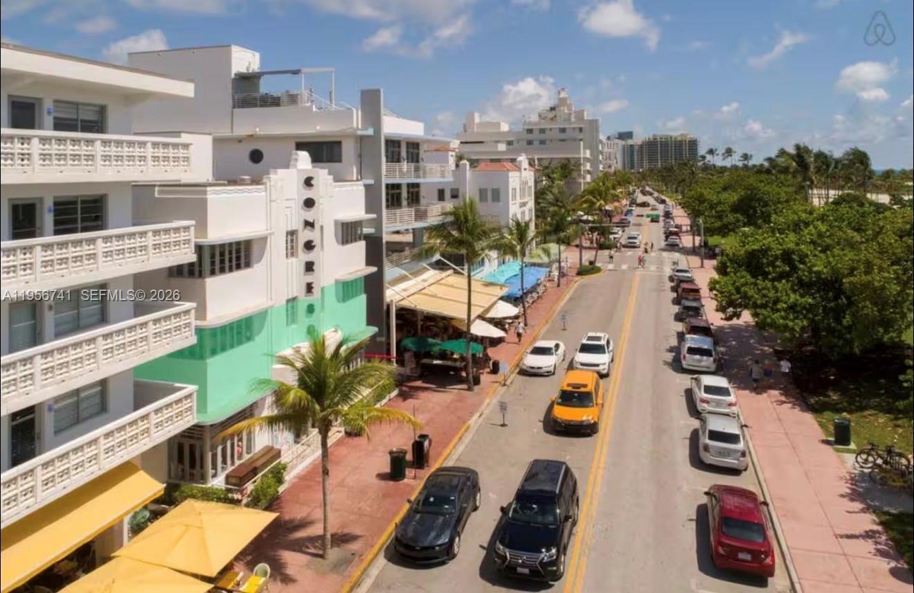 An elevated street view of Ocean Drive in Miami Beach featuring Art Deco architecture — 1036 Ocean Dr # B201, Miami Beach FL 33139, MIAMI BEACH, FL