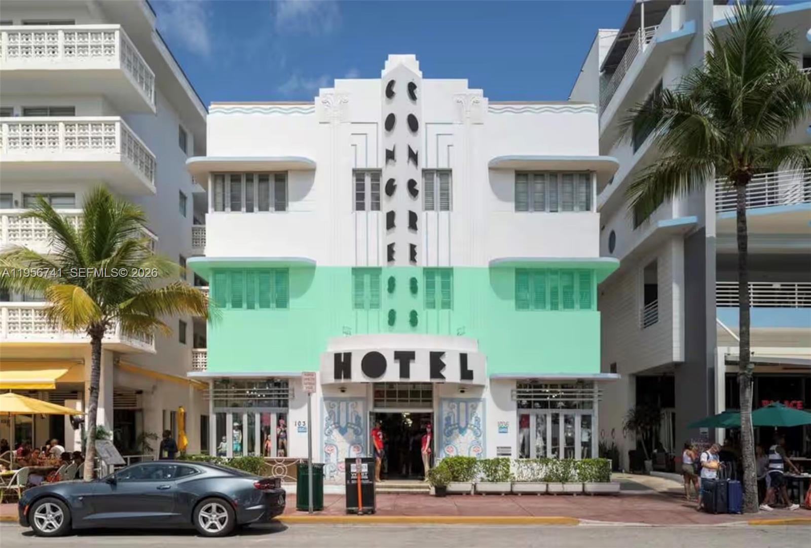 The exterior of a three-story Art Deco hotel building with a green-painted midsection — 1036 Ocean Dr # B201, Miami Beach FL 33139, MIAMI BEACH, FL