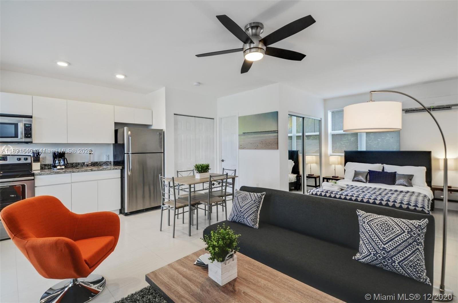 This studio apartment features a kitchen, dining area, living space, and bedroom in one room — 2601 NW 1st Ave # 4, Miami FL 33127, MIAMI, FL