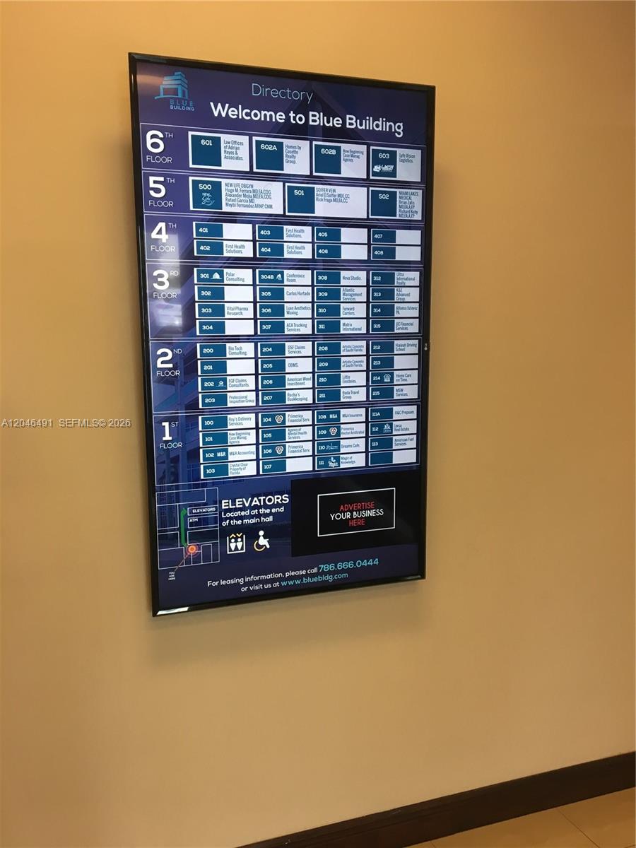 A digital building directory displays tenant names and suite numbers for six floors — 2300 W 84th St # 104, Hialeah FL 33016, HIALEAH, FL