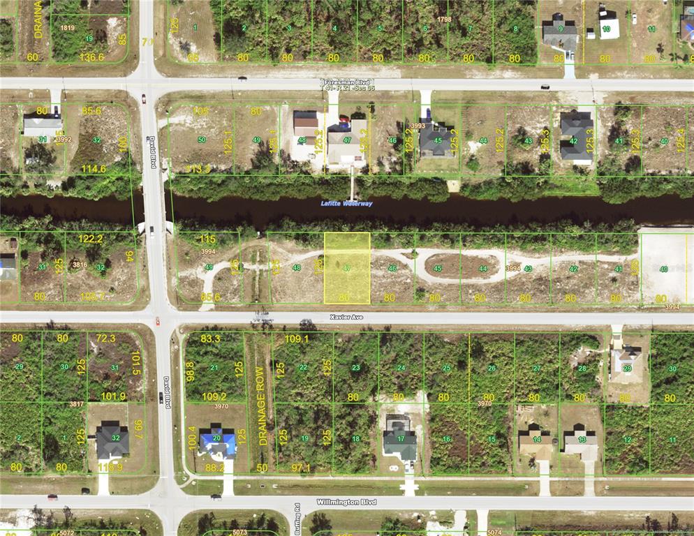 This is an aerial map showing residential lots, a waterway, and surrounding streets — 12768 XAVIER AVENUE, PORT CHARLOTTE, FL