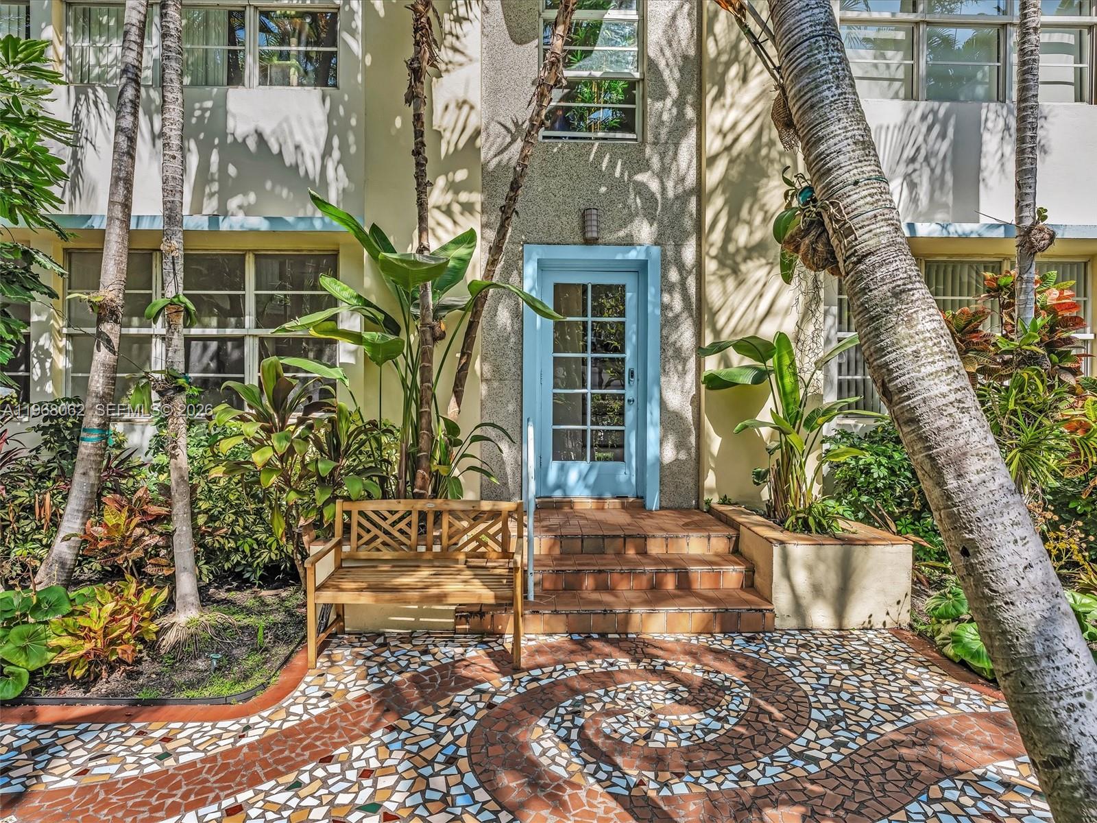 A light blue door sits at the top of tiled steps with a mosaic patio — 503 12th St # 5, Miami Beach FL 33139, MIAMI BEACH, FL