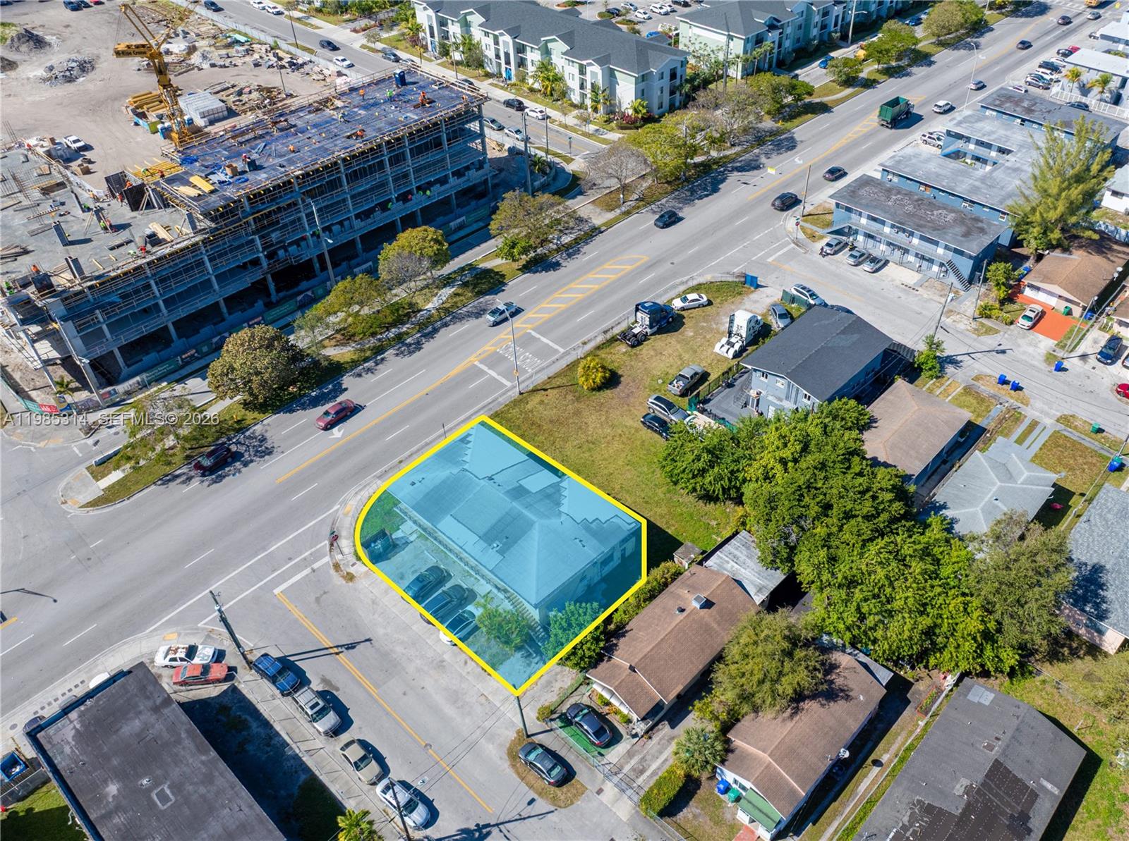 An aerial view shows a corner lot with a building highlighted in blue — 6401 NW 12th Ave, Miami FL 33150, MIAMI, FL