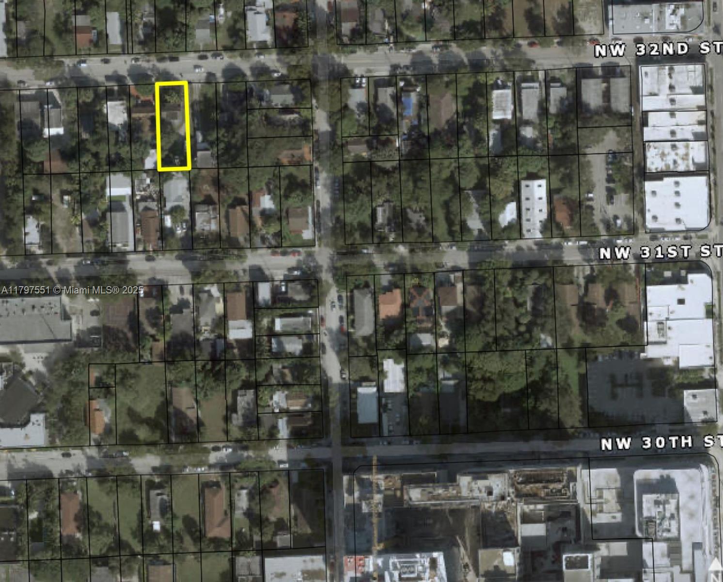 This is an aerial map showing a highlighted rectangular residential lot in a city neighborhood — 134 NW 32nd St, Miami FL 33127, MIAMI, FL
