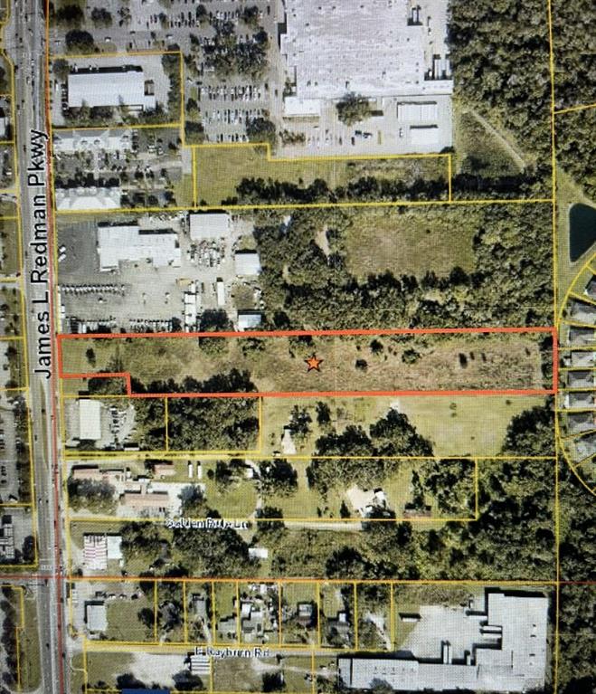 An aerial map shows a rectangular parcel of land outlined in red with a star — 2906 JAMES L REDMAN PARKWAY, PLANT CITY, FL