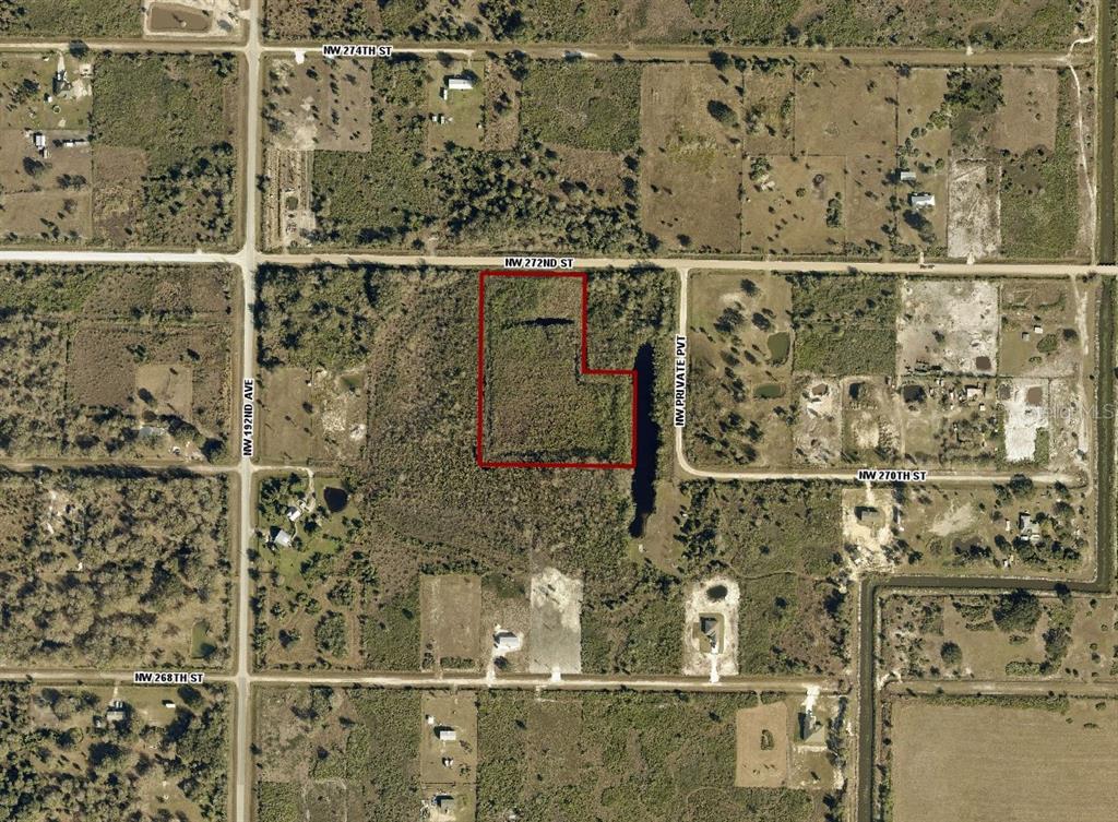 An aerial map shows a vacant, L-shaped parcel of land outlined in red — 18924 NW 272ND STREET, OKEECHOBEE, FL