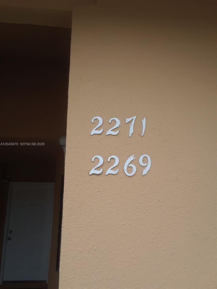 The numbers 2271 and 2269 are mounted on a beige exterior wall — 2271 SW 80th Ter # 2271, Miramar FL 33025, MIRAMAR, FL