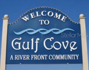 A blue sign welcomes visitors to the Gulf Cove river front community — 5072 MONTEGO LANE, PORT CHARLOTTE, FL