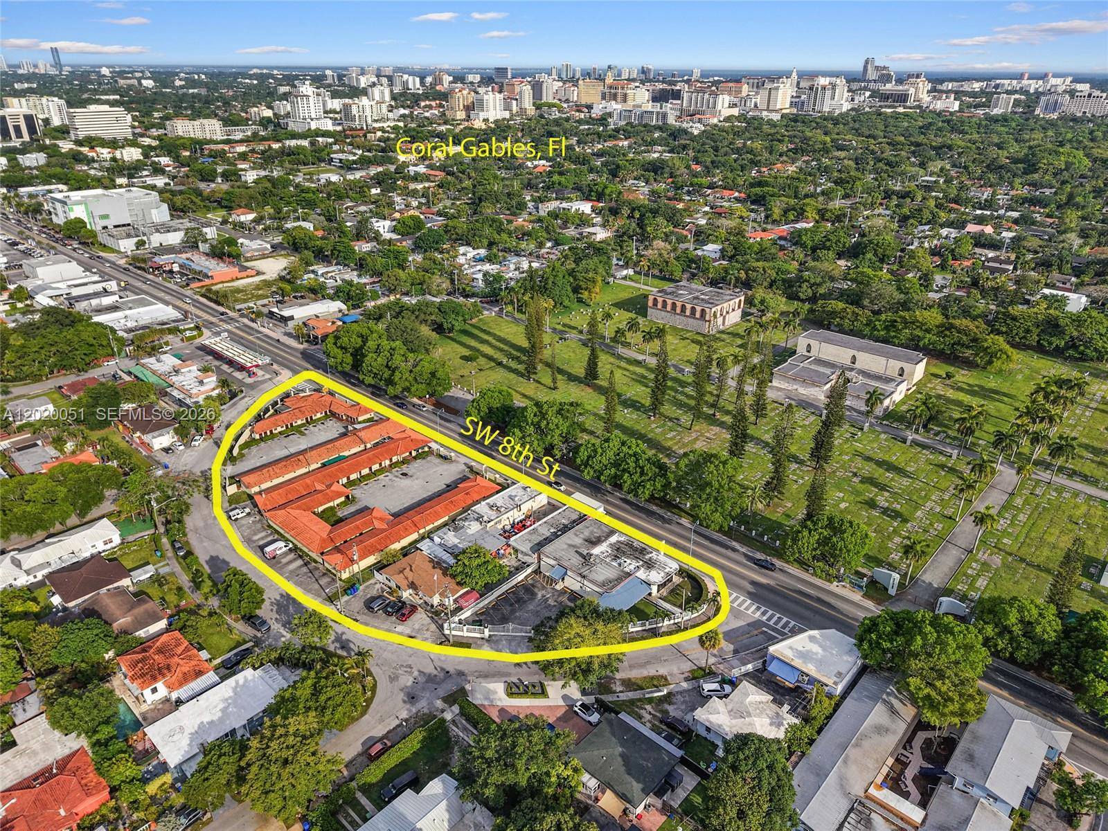An aerial view shows a commercial property outlined in yellow along a busy street — 4445 SW 8th St, Miami FL 33134, MIAMI, FL