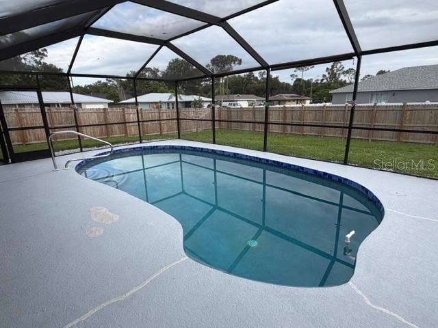 This is a floor plan showing a house with three bedrooms, two bathrooms, and a garage — 20167 HOLLAND AVENUE, PORT CHARLOTTE, FL