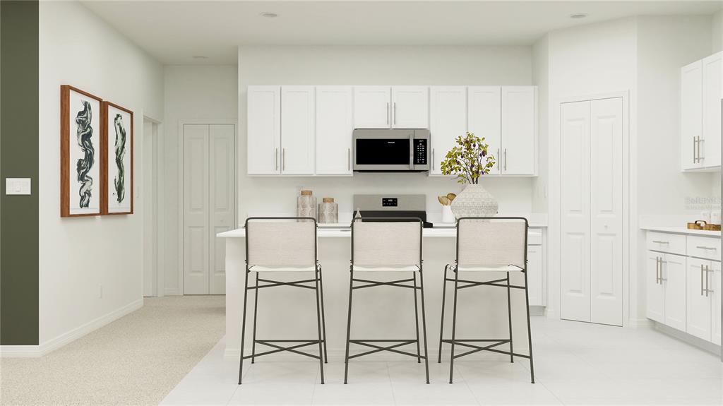 This is a rendering of a modern kitchen featuring white cabinets, stainless appliances, and bar seating — 2731 LOOKOUT RIDGE ROAD, HAINES CITY, FL