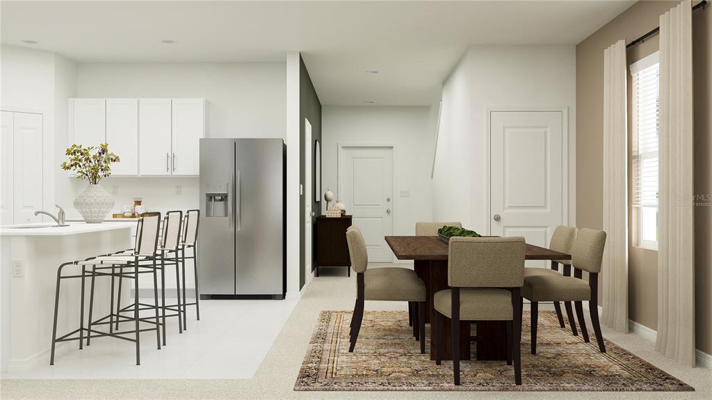 This is a rendering of an open-concept kitchen and dining area with neutral finishes — 2731 LOOKOUT RIDGE ROAD, HAINES CITY, FL