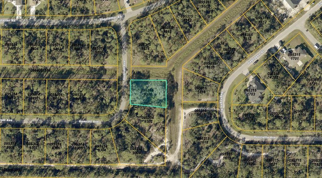 This is an aerial map showing a highlighted vacant lot in a residential neighborhood — GAMROTT AVENUE, NORTH PORT, FL